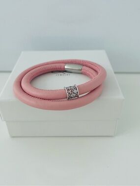Pink double leather bracelet with silver modern charm.